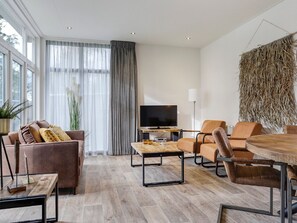 Chalet | Living area - Modern Holiday Home at the Edge of the Forest (Markelo)