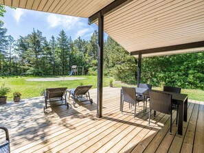 Outdoor dining - 6 Person Holiday Home in Norre Nebel (Norre Nebel)