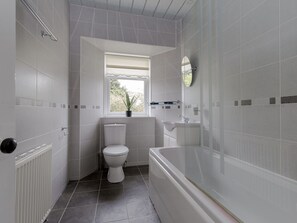 Bathtub, hair dryer, towels