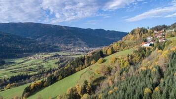 A mountainous landscape with a town nestled in the valley.