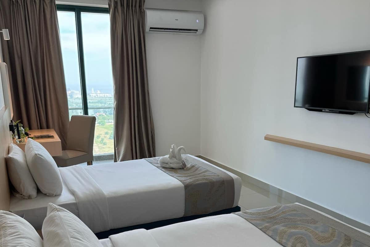 Chambre Deluxe avec lits jumeaux | Bureau, Wi-Fi gratuit, draps fournis