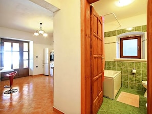 A kitchen with a refrigerator, oven, and sink. - Authentic Villa in Tinjan With Private Pool (Tinjan)