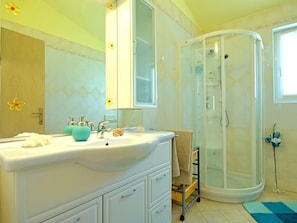 Bathtub, hair dryer, towels