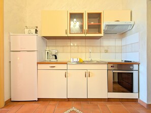 Fridge, oven, coffee/tea maker, toaster