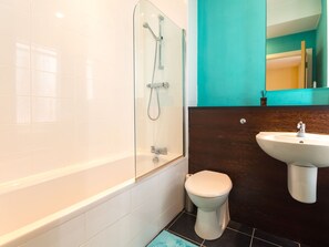 Bathtub, hair dryer, towels