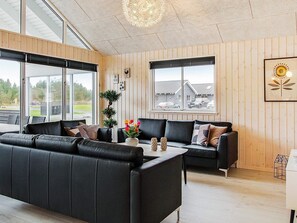 Casa | Sala de estar | Un reproductor de DVD, una estación de conexión para MP3