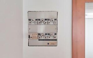 A wall-mounted electrical panel with multiple switches and indicators. - 4 Person Holiday Home in Store Fuglede (Store Fuglede)