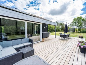 Outdoor dining - 8 Person Holiday Home in Norre Nebel (Norre Nebel)