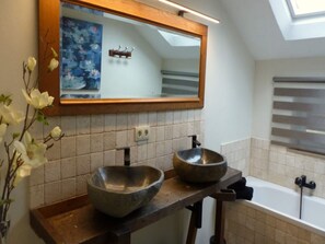 Bathtub, hair dryer, towels