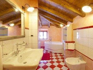 Bathtub, hair dryer, towels