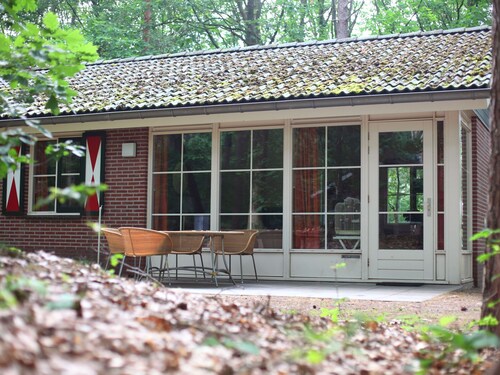 Restyled Bungalow With Fireplace in a Carfree Park