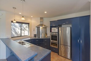 Fridge, microwave, oven, stovetop - On The Rocks - Modern Waterfront Villa (Nelson)