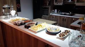 Enjoy a well-equipped kitchen with a variety of snacks and refreshments.