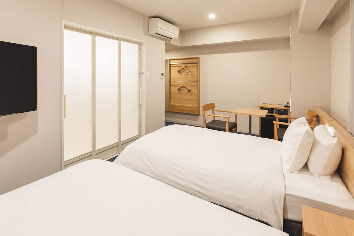 Premium bedding, down duvets, desk, free WiFi