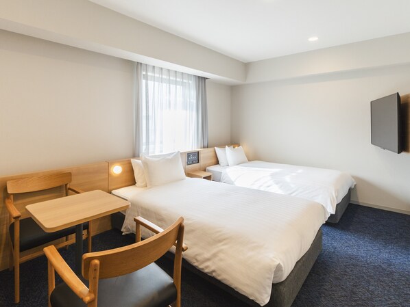 Superior Universal Twin, Non Smoking | Premium bedding, down comforters, desk, free WiFi