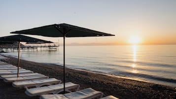 Private beach nearby, sun-loungers, beach umbrellas