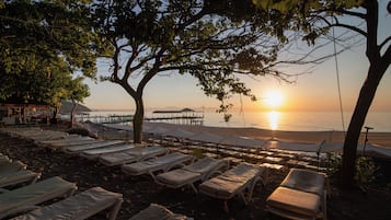 Private beach nearby, sun-loungers, beach umbrellas