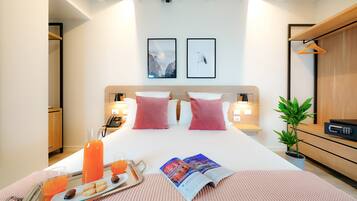 Classic-huone | 1 makuuhuone, ylelliset vuodevaatteet, untuvapeitot, minibaari