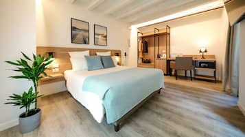Habitación Deluxe | 1 habitación, ropa de cama de alta calidad, edredón y minibar