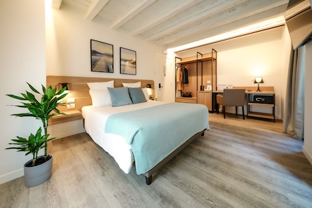 1 habitación, ropa de cama de alta calidad, cubrecamas y minibar