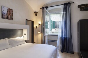 2 habitaciones, tabla de planchar con plancha, cunas y wifi gratis