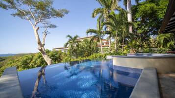 2 outdoor pools, pool umbrellas, pool loungers