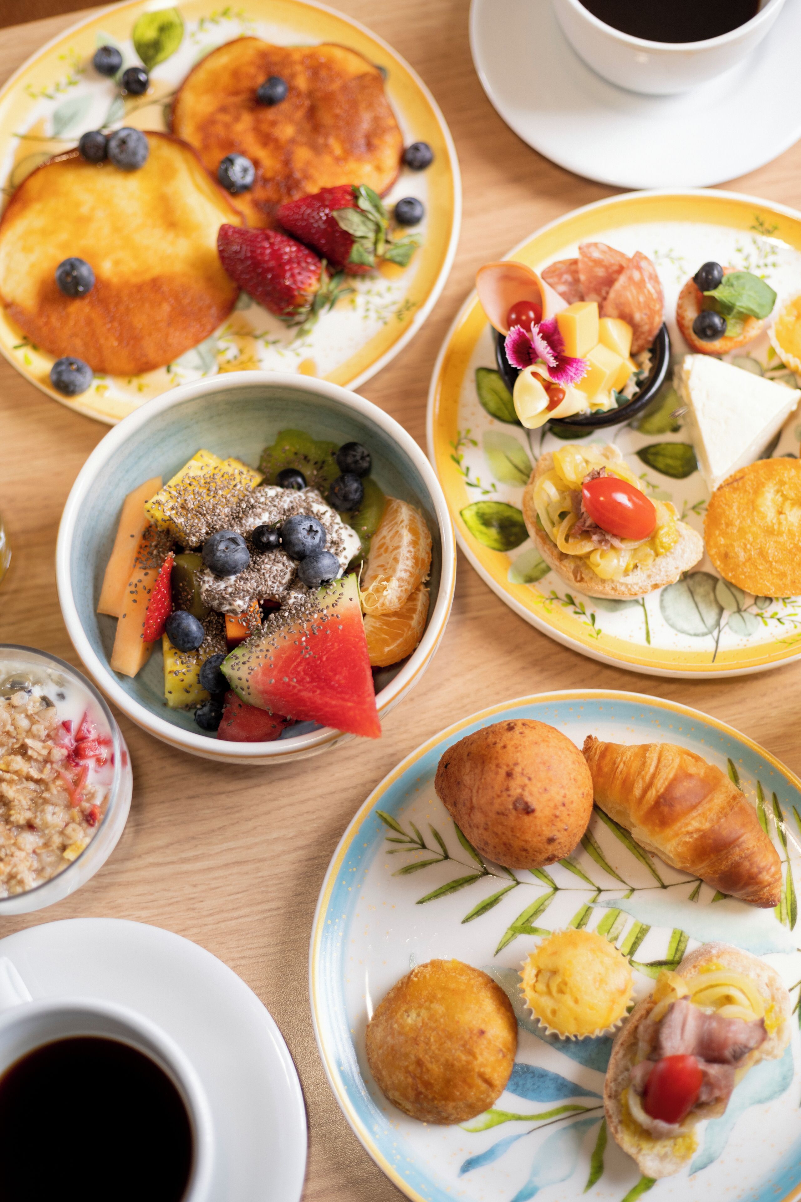 A variety of breakfast dishes on a table.