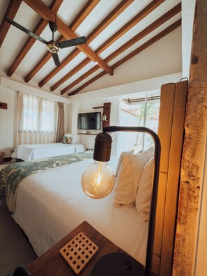 Triple Room | Free minibar, in-room safe, blackout curtains, iron/ironing board