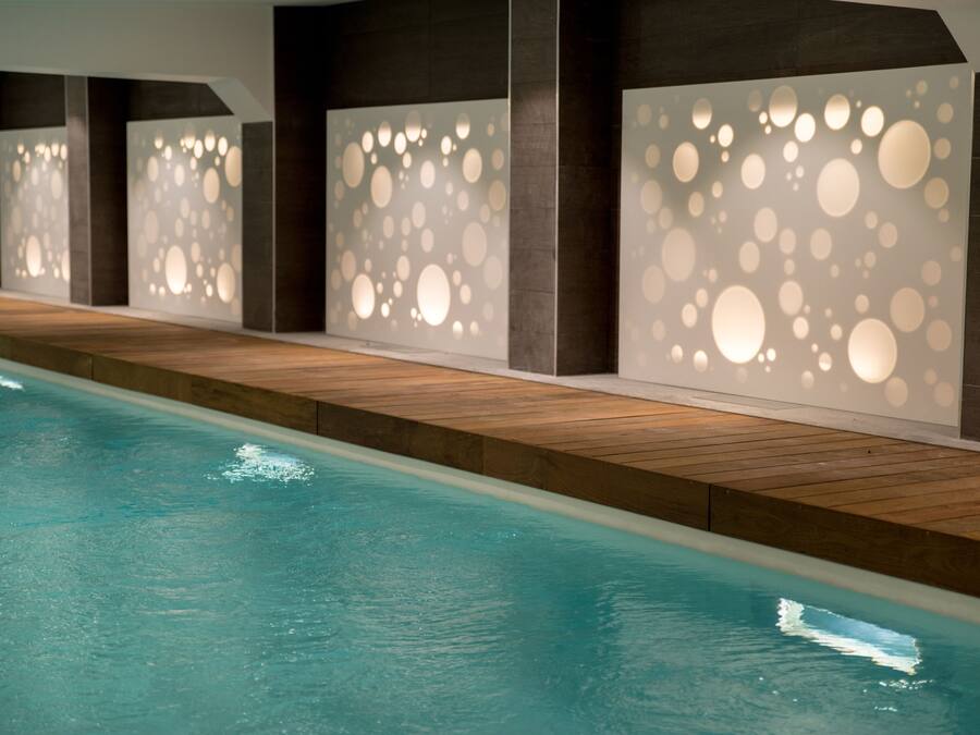 Indoor pool, open 8:00 AM to 10:00 PM, pool loungers