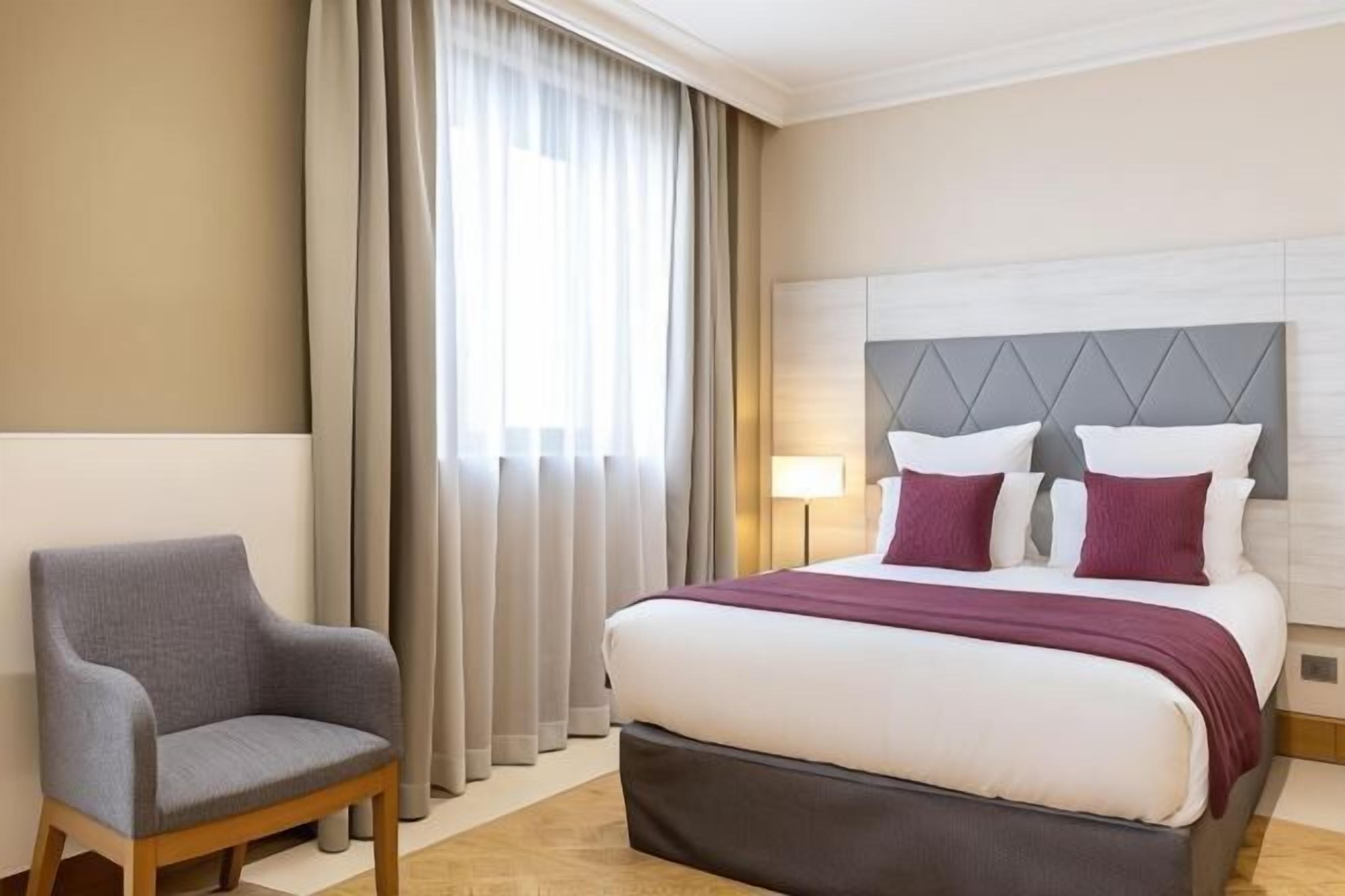 In-room safe, desk, laptop workspace, blackout curtains