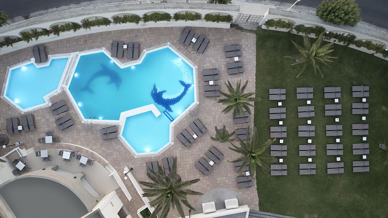 seasonal outdoor pool, pool umbrellas, pool loungers