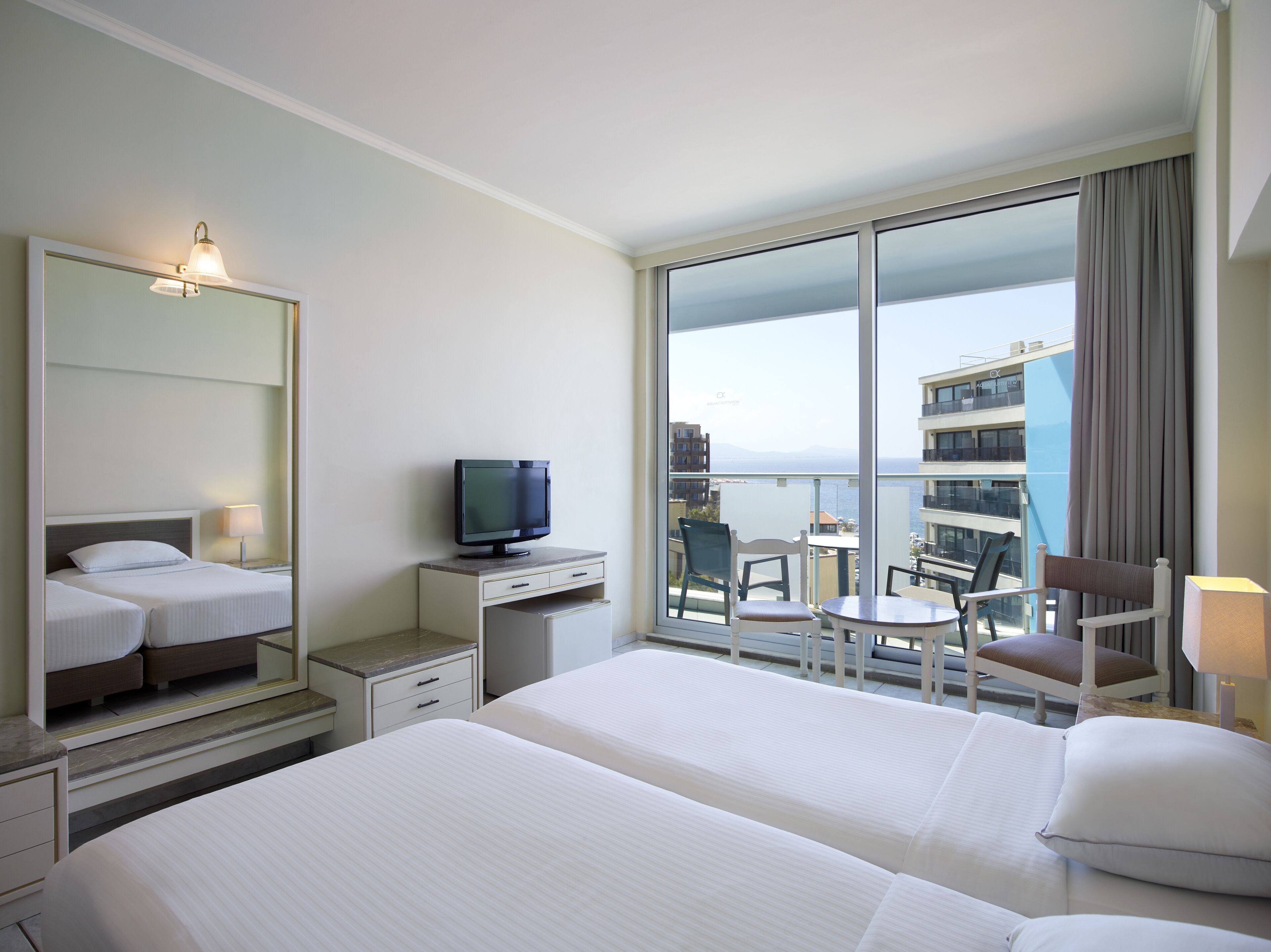 standard double or twin room, partial sea view | in-room safe, blackout curtains, free wifi, bed sheets
