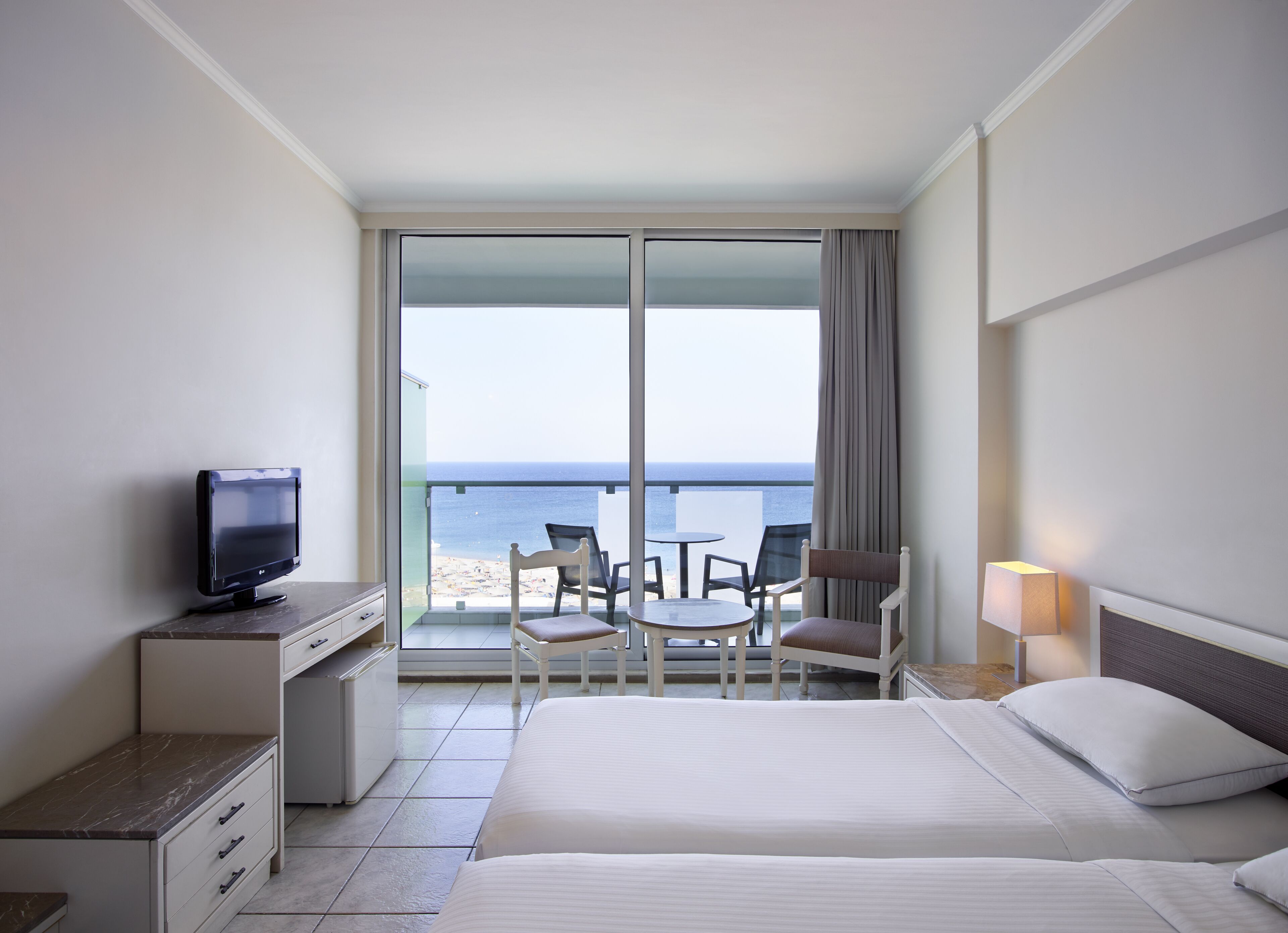 standard double or twin room, sea view | in-room safe, blackout curtains, free wifi, bed sheets