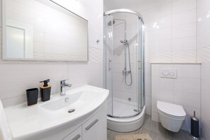 Shower, hair dryer, towels, soap