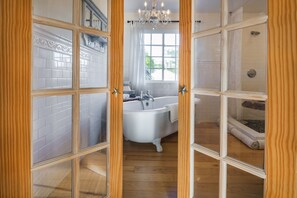 Combined shower/tub, hair dryer, towels, soap