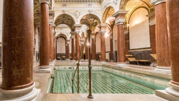 A grand hall with marble columns, a central pool, and ornate ceiling details. - Centralni Lazne Ensana Health Spa Hotel (Marianske Lazne)