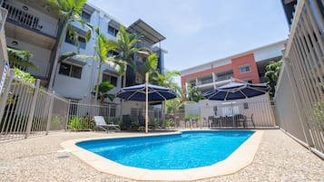 Outdoor pool, open 7:00 AM to 9:30 PM, pool umbrellas, pool loungers