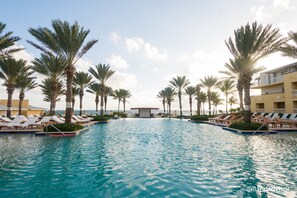 Beachfront pool with swim up bar - Sits on the edge of a private beach and offers spacious rooms with ocean views (St. Maarten)