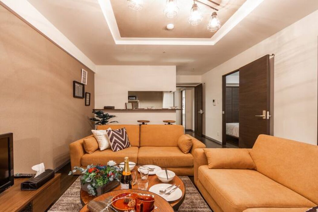 Apartment, Non Smoking | Living area | Flat-screen TV