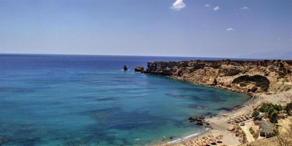 Guests can enjoy breathtaking ocean views and access to a scenic beach with a rocky shoreline.