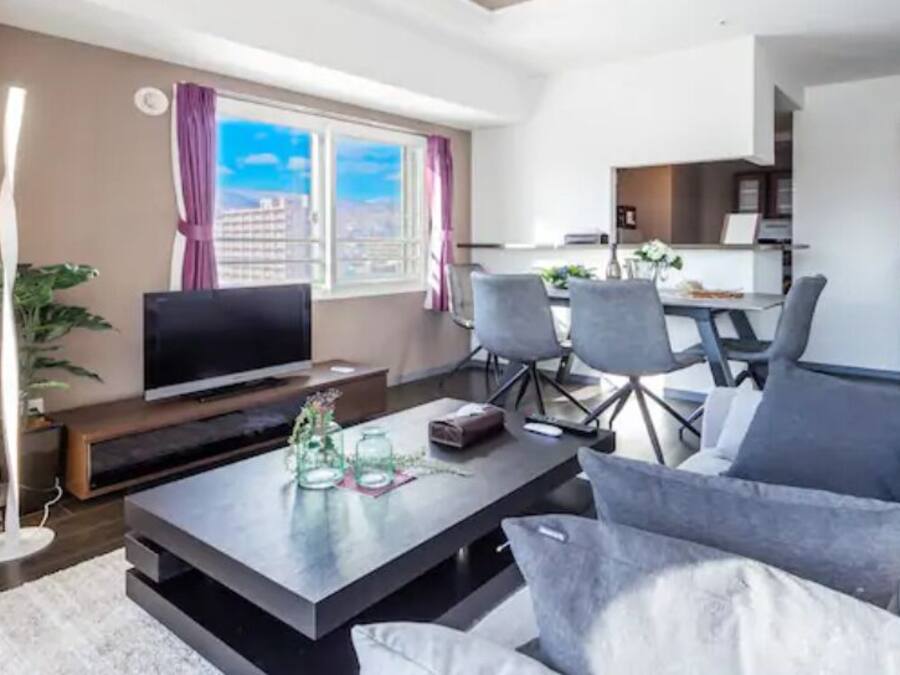 Apartment, Non Smoking | Living area | Flat-screen TV