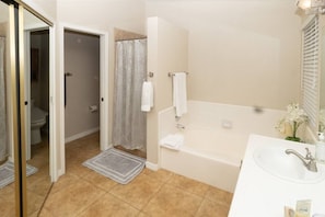 Bathtub, hair dryer, towels