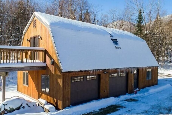 Full home with French doors leading to 2nd story deck