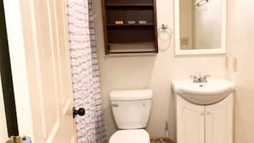 Combined shower/tub, hair dryer, towels, soap