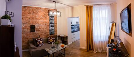 Design Apartment | Living area | Flat-screen TV