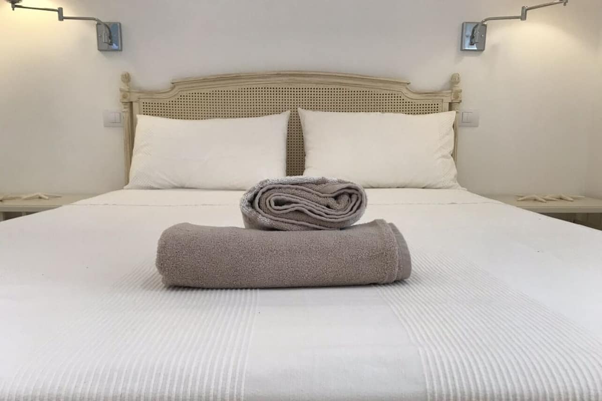 Frette Italian sheets, premium bedding, down duvets, memory-foam beds