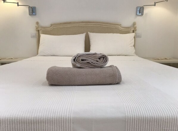 Frette Italian sheets, premium bedding, down duvets, memory-foam beds