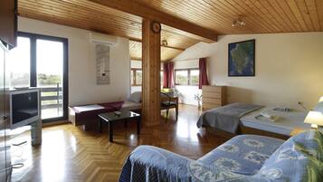 Apartment, 2 Bedrooms, Balcony | Living area | 40-inch TV with satellite channels