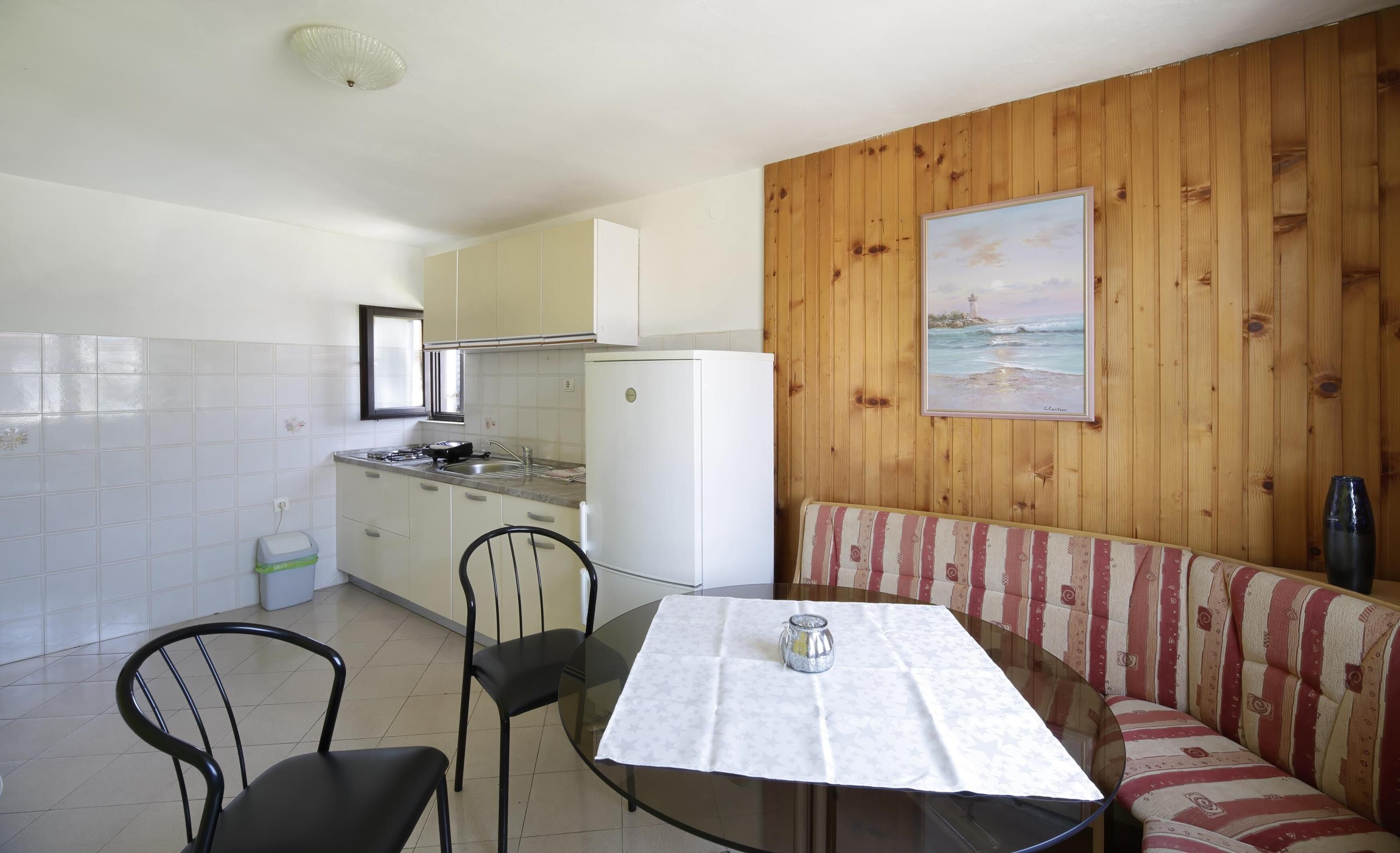 Apartment, 2 Bedrooms, Balcony | Private kitchen | Fridge, microwave, stovetop, coffee/tea maker