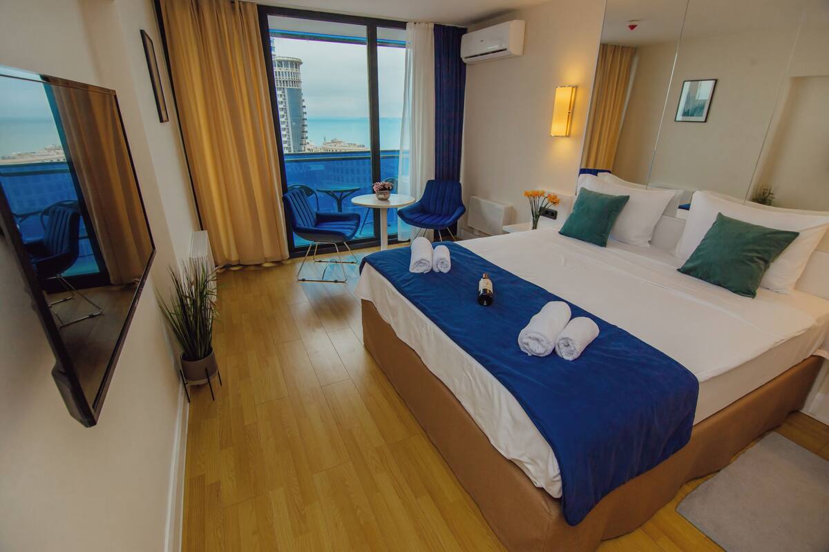 Chambre Deluxe, 1 très grand lit, vue mer